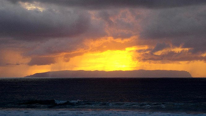 view of sunset over Niihau from Kauai