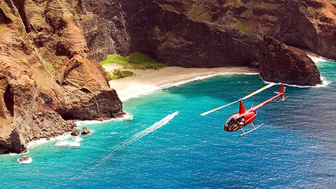 Helicopter tour flying down Na Pali Coast, Kauai