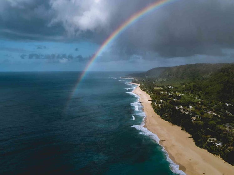 North shore aerial view with rainbow and beach