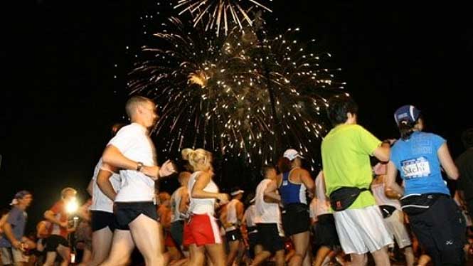 Honolulu marathon with fireworks in background